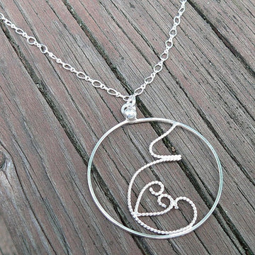 Fluttering Love... A pregnancy necklace. Hand Forged Sterling Silver