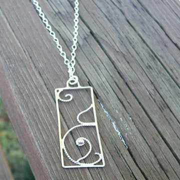 Curls of Love... A pregnancy necklace. Hand Forged Sterling Silver